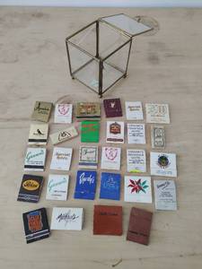 lot 79 image: Collection of Matchbooks in Glass Display Case