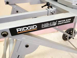 lot 9 image: Rigid 12 Compound Miter Saw Mounted On a Rolling Utility Stand