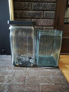 Two Glass Battery Containers