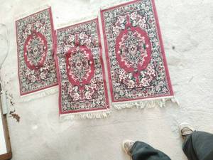 lot 62 image: Three Small Rugs