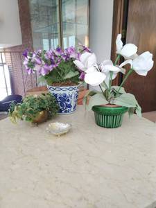 lot 67 image: Collection Of Faux Flowers