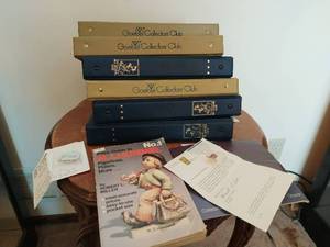 lot 131 image: Collection of Goebel Hummel Guides, Pins, Brochures, and More.