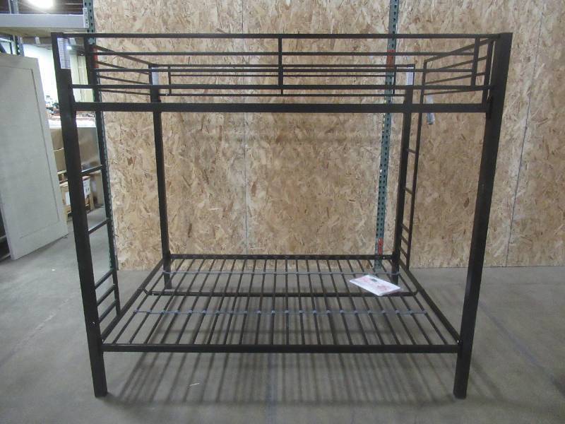 lot 101 image: DHP Full-over-Full Bunk Bed for Kids, Metal Frame with Ladder, Black, 5530096 - Assembled.