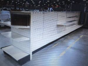 lot 207 image: Retail Gondola Display and Shelving (4ft wide per section). Auction is for the gondola and shelves in photo.