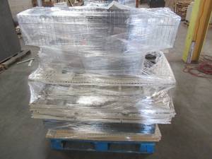 lot 209 image: Retail Gondola Display and Shelving (4ft wide per section). Auction is for the gondola and shelves in photo.