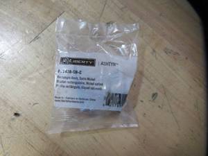 lot 802 image: 12-PC Liberty Hardware Ashtyn 1-12 Satin Nickel Rectangular Cabinet Knob Model P22438-SN-C