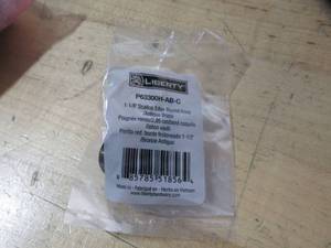 lot 813 image: 25 Pack Liberty Hardware 1-18 in. Scallop Edge Round Antique Brass Knob Model P63300H-AB-C