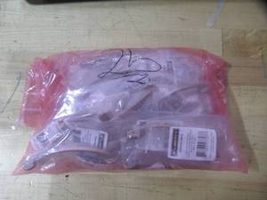 lot 818 image: 25 Pack Liberty Hardware Martini Bow Handle Cabinet Pull Model PN0305-SN-C