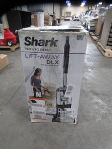 lot 239 image: Shark Navigator Lift-Away Deluxe Bagless Upright Vacuum Cleaner ModelUV440