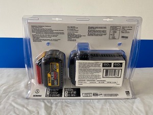 lot 88 image: DEWALT FLEX VOLT BATTERY CHARGER AND BATTERY