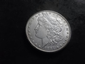 lot 13 image: 1881 CC Silver Morgan Dollar