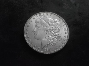 lot 24 image: 1884 Silver Morgan Dollar
