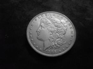 lot 30 image: 1885 O Silver Morgan Dollar