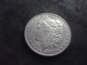 lot 31 image: 1885 S Silver Morgan Dollar