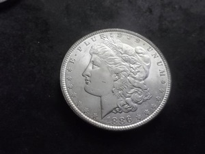 lot 32 image: 1886 Silver Morgan Dollar