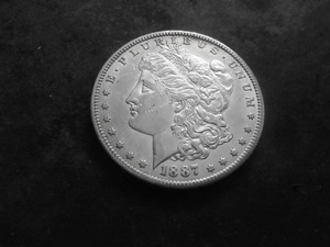 lot 37 image: 1887 S Silver Morgan Dollar
