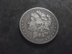 lot 42 image: 1889 CC Silver Morgan Dollar