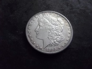 lot 44 image: 1889 S Silver Morgan Dollar