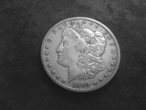 lot 46 image: 1890 CC Silver Morgan Dollar
