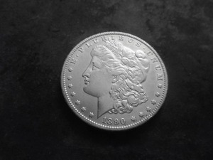 lot 47 image: 1890 O Silver Morgan Dollar