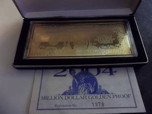 lot 55 image: Million Dollar Golden Proof.999 4 Oz. Pure Silver Layered In 24 Karat Gold 6 x 2 12 With COA With Original Case & Box
