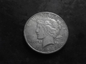 lot 65 image: 1924 S Silver Peace Dollar