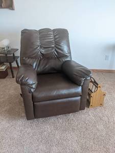 Ashley Furniture Recliner - and Wood Magazine Rack - Nice Condition -  Please bring help to remove - This is located at ground level with no stairs - NO SHIPPING ON THIS AUCTION