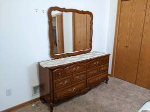 Beautiful Dresser w Mirror - Dresser Measures 65 x 17 x 31 and the Mirror is 46 x 38 - Please bring help to remove - This is located at ground level with no stairs - NO SHIPPING ON THIS AUCTION