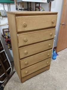Wood Chest of Drawers - Measures 50-12 x 29 x 17-12 - Please bring help to remove - This is located at ground level with no stairs - NO SHIPPING ON THIS AUCTION