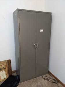 Metal 2-Door Storage Cabinet - Measures 72 x 36 x 18 - Includes Key - Please bring help to remove - This is located at ground level with no stairs - NO SHIPPING ON THIS AUCTION