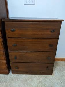 4-Drawer Chest of Drawers - Measures 28-12 x 14 x 34-12 - - Please bring help to remove - This is located at ground level with no stairs - NO SHIPPING ON THIS AUCTION