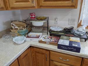 Large Lot of Kitchenware - Baskets, Griddle, New Serving Platters and More - Please bring boxes as none will be available at the auction - NO SHIPPING