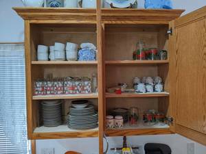 Contents of (2) Cupboards - Glasses Plates and More - Cupboard and Items on the top of cupboard are NOT Included - Please bring boxes as none will be available at the auction - NO SHIPPING
