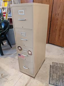 Metal 4-Drawer File Cabinet - 52 x 25 X 15 - Please bring help to remove - This is located in the Attached Garage - NO SHIPPING ON THIS AUCTION