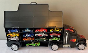 lot 18 image: 25 Cars and a Semi Truck Carrying Case