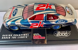 lot 27 image: Racing Champions Under the Lights Y2K Chevrolet Die Cast Car