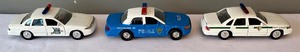 lot 31 image: Police Cars, Buses and Taxis