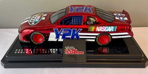 lot 38 image: Racing Champions Under the Lights Y2K Chevrolet Die Cast Car