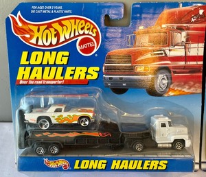 lot 148 image: New Hot Wheels Long Hauler and Pavement Pounder
