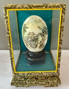Two Asian Egg Decorative Figurines