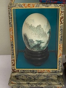 Three Decorative Asian Eggs in Display Cases
