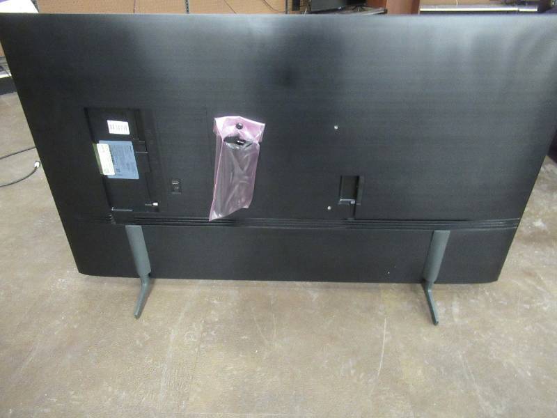 lot 114 image: Samsung - 50 Class Q60A Series QLED 4K UHD Smart Tizen TV Model QN50Q60AAFXZA, With Remote - Multiple Scratches Left of Center (See Photos).
