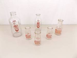 Lot of Copper County Gallon, Quart, Pint, and Half Pint Glass Milk Bottles