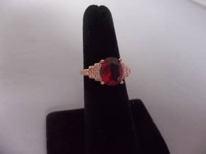 Ring-Rose Gold Tone Band With Large Razzberry Red Center Stone Size 6
