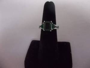 Ring-Silver Tone Band With Green Stones Size 6