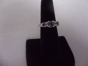 Ring-Silver Tone Band With Purple Stones Size 6