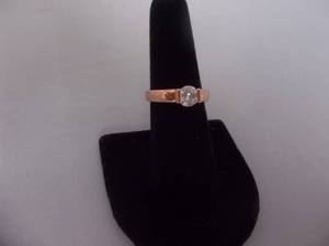 Ring-Rose Gold Tone Band With Stone Size 7