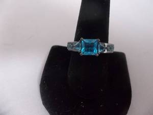 Ring-Gun Metal Tone Band With Blue Stones Size 10