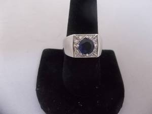 Ring-Silver Tone Band Marked 925 With Blue Stone Size 10