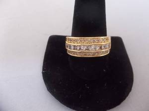 Ring-Gold Tone Band Marked 10KT With White Stones Size 12